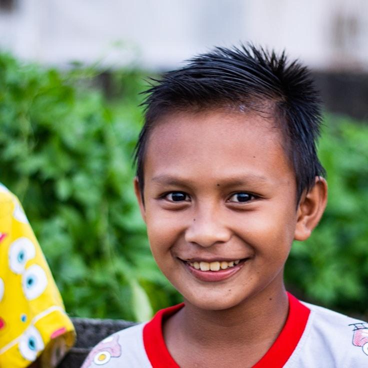 Kaveri Mehta, Lead Design Curator at Syntavion Procession, reviewing corporate floral arrangements